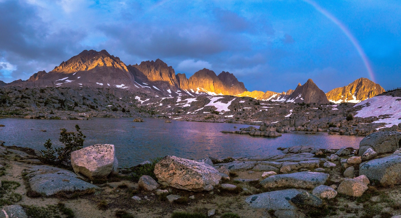 A rainbow above an alpine lake in the Dusy Basin of Kings Canyon National Park in the Sierras