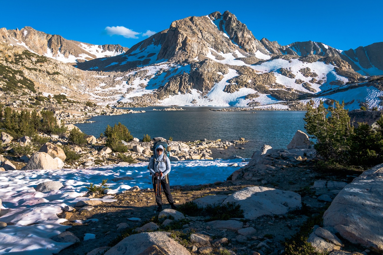 Sam arriving at Muriel Lake. Muriel Peak in the background.