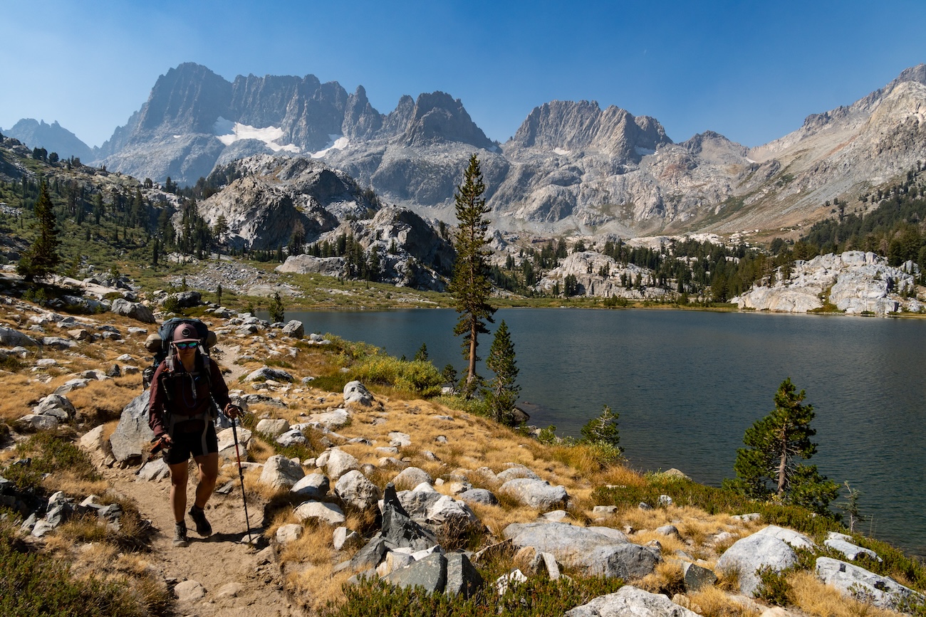 Sam Stych hiking near the shore of Ediza Lake in the Sierra