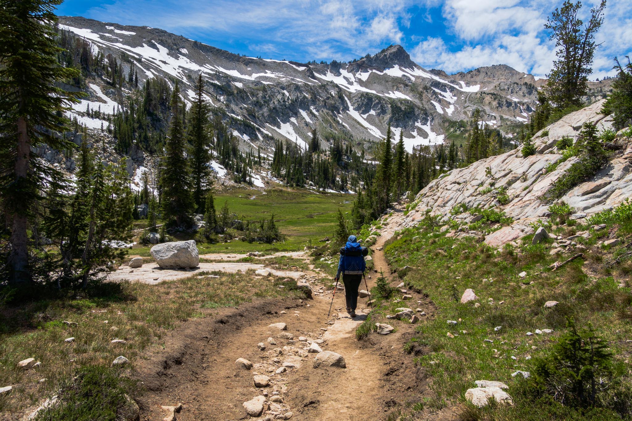 Sam hiking out of the lakes basin